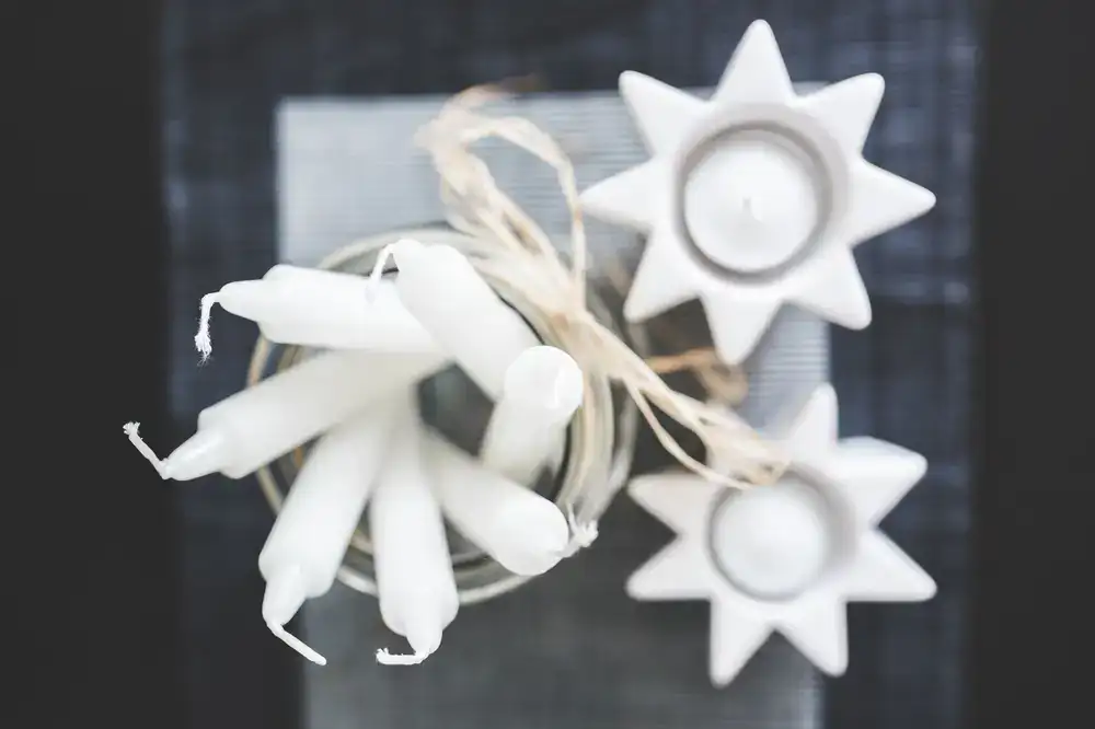 Handmade candles arranged gracefully in a modern minimalist concept store